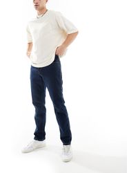 Wrangler - – texas – slim fit jeans - Lyst