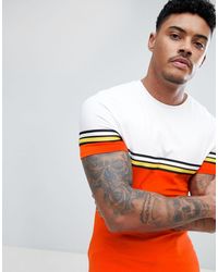 ASOS - Muscle Fit Longline T-shirt With Bright Colour Block And Taping In Orange - Lyst