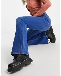Jeans a zampa d'elefante Bershka da donna - Fino al 50% di sconto | Lyst