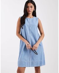 Pieces - Robe courte sans manches en denim - clair - Lyst