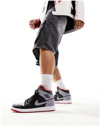 Nike - Air 1 - baskets mi-hautes - et gris - Lyst
