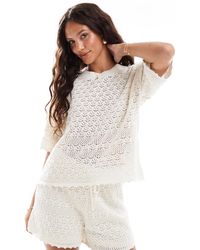 Vero Moda - – kastiges t-shirt aus häkelstrick - Lyst