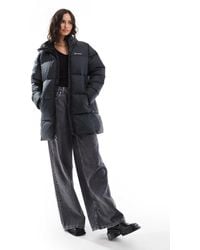 Columbia - – puffect ii – mittellange pufferjacke - Lyst