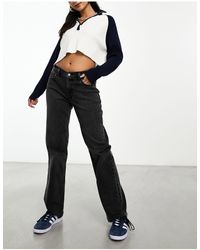 Abercrombie & Fitch - Jeans ampi a vita alta neri con fondo grezzo - Lyst