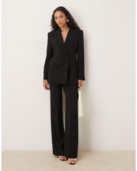 Mango - Pantaloni Sartoriali Neri Con Pieghe Sul Davanti - Lyst