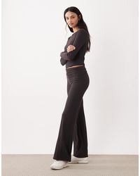 Tala - 365 Roll Waist Flared Trousers - Lyst