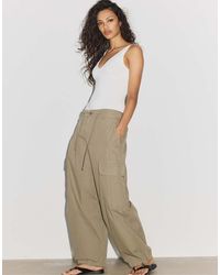 Stradivarius - V-neck Bodysuit - Lyst