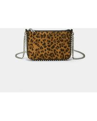 Stradivarius - Mini-tasche mit print und nieten - Lyst