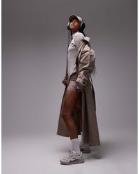 Nike - Leggings Cortos De 4" Marrones De Talle Alto Swift Dri-Fit De - Lyst