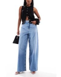 ONLY - – paulina – weite jeans aus hellem denim mit hohem bund - Lyst