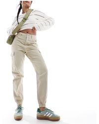 New Look - Pantalones cargo color piedra con bajos ajustados - Lyst