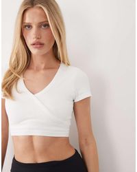 4505 - Seamless Baby Rib Wrap Front Short Sleeve Top - Lyst