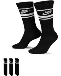 Nike - Essential - confezione da 3 paia di calzini bianchi e neri - Lyst