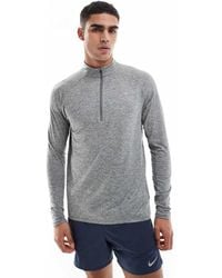 Nike - Camiseta De Manga Larga Con Media Cremallera Dri-Fit Stride De - Lyst