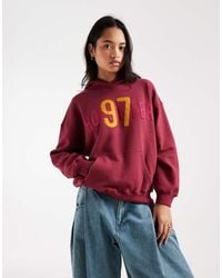 Hollister - Oversized Logo Graphic Hoodie - Lyst