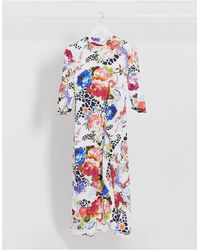 Vila – Hochgeschlossenes Kleid mit nach hinten abfallendem Saum und Blumenmuster - Mehrfarbig