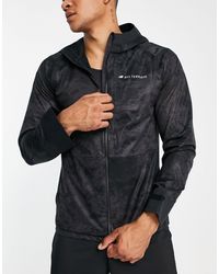 New Balance - All terrain - giacca impermeabile nera con zip - Lyst