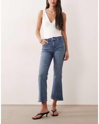 GOOD AMERICAN - Good Legs Cropped Mini Boot Jeans - Lyst