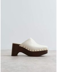 ARRANGE - Leather Studded Clogs - Lyst