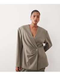 ARRANGE - Curve Cinched Collarless Pleated Wrap Blazer - Lyst