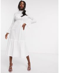 asos design premium broderie maxi dress with pep hem and fluted sleeves
