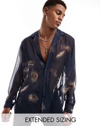 ASOS - Camisa holgada con estampado floral fotográfico y solapas marcadas - Lyst