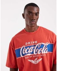 ASOS - Oversized T-shirt With Coca Cola Print - Lyst