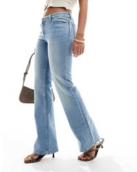 Monki - Vaqueros Azules De Corte Bootcut Y Talle Bajo Con Lavado Claro Wakumi De - Lyst