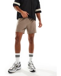 4505 - Ripstop Running Shorts With Zip Side Pockets - Lyst
