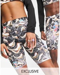 pantaloncini con stampa distorta di Collusion in Nero Unisex Donna Abbigliamento da Shorts da Shorts cargo multitasche 