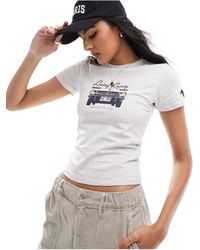 Cotton On - Cotton on - t-shirt ampia con bordi a contrasto e grafica "ford" rétro - Lyst