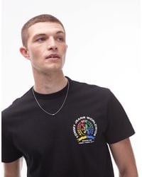 Tommy Hilfiger - T-shirt avec écusson logo coloré et imprimé au dos - Lyst