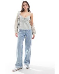 Hollister - Vaqueros De Talle Bajo Y Corte Holgado Con Lavado Claro Desgastado De -Azul - Lyst