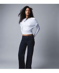 Bershka - Petite Low-rise Studded baggy Jeans - Lyst