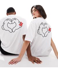 ASOS - Disney - t-shirt unisex oversize bianca con stampa di topolino e minnie e di mani - Lyst