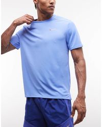 Nike - Camiseta Azul Con Protección Uv Miler Dri-Fit De - Lyst