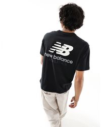 New Balance - T-shirt nera con stampa sul retro - Lyst