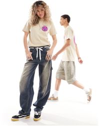 Obey - T-shirt a maniche corte beige unisex con stampa di pantere stile yin-yang - Lyst