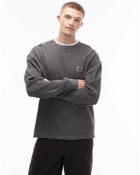 Carhartt - Camiseta Negra De Manga Larga Y Corte Suelto De Punto Gofrado Vista De - Lyst