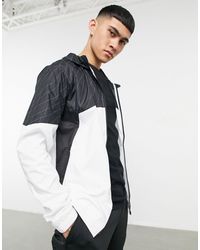 puma packable hooded jacket in black 85162101
