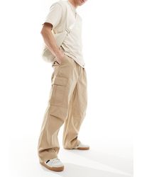 Carhartt - Cole - pantaloni cargo beige - Lyst