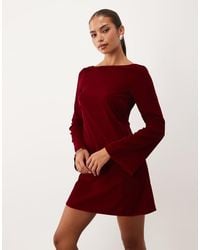 Nobody's Child - Joelle Open Back Tie Detail Long Sleeve Velvet Mini Dress - Lyst