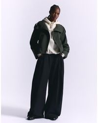 Bershka - Pantaloni Tecnici A Palloncino Stile Paracadutista Neri - Lyst