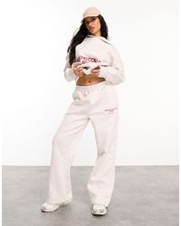 ASOS - Oversized jogger With Red Stacked Logo - Lyst