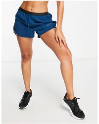 Nike - Run division tempo luxe dri-fit - pantaloncini verde-azzurro - Lyst