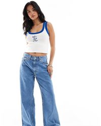 ASOS - Vaqueros Dad Azul Pálido De Pernera Ancha De Asos Design Petite - Lyst