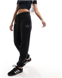 adidas Originals - Adidas training - joggers neri - Lyst