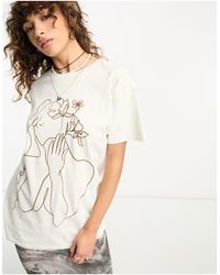 Reclaimed (vintage) - T-shirt écru con volto delineato e rose - Lyst