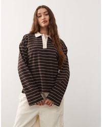 Monki - Polo style rugby oversize à rayures avec manches longues - marron - Lyst