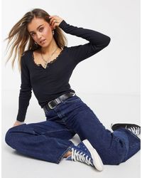 Women's Hollister Long-sleeved tops from $20 | Lyst